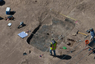 Archaeologists excavate a Hohokam pit structure at Fort Lowell (photograph by Henry Wallace, 2012)